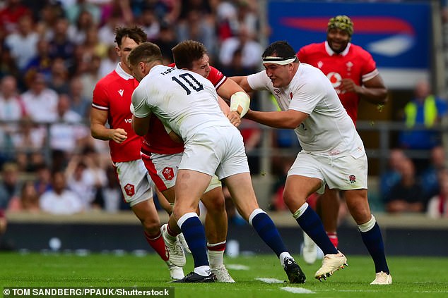 The England fly-half was initially sent to the sin bin for the above tackle on Taine Basham (middle) of Wales
